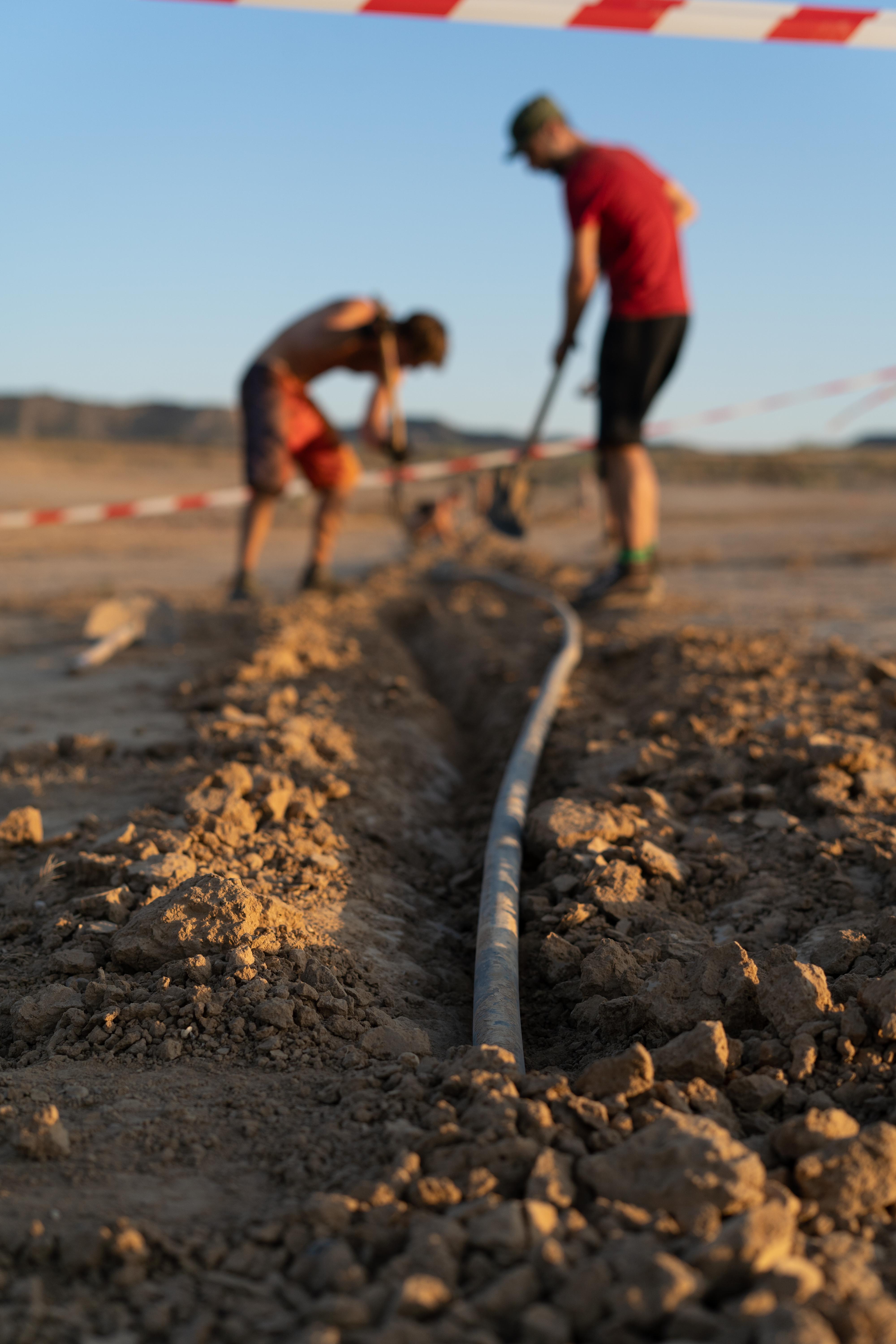 Community members building infrastructure at a burn event